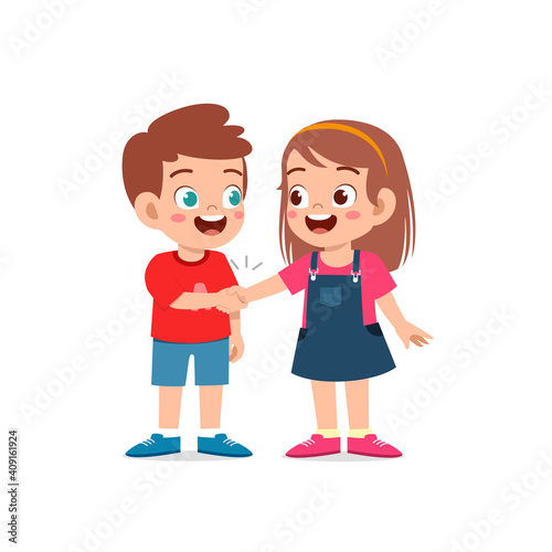 cute little kid boy do hand shake with his friend