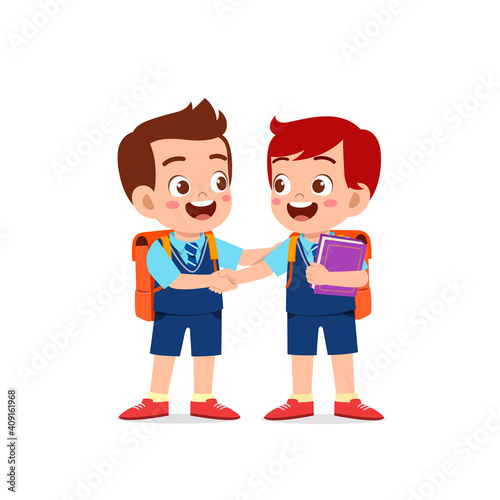 cute little kid boy do hand shake with his friend