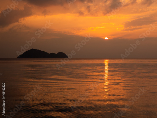  Sunset time above the ocean © Glebstock