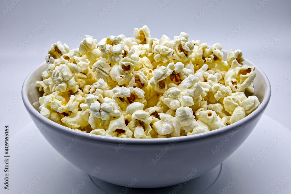 A bowl of Popcorn isolated on white background
A bowl of Popcorn isolated on white background