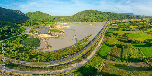 Aerial image of ripen rice fileds in Ta Pa, Bay Nui , An Giang - Vietnam
 photo