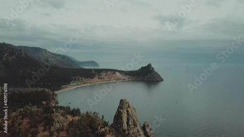 Drone video. Summer. Lake. The mountains. Sandy bay