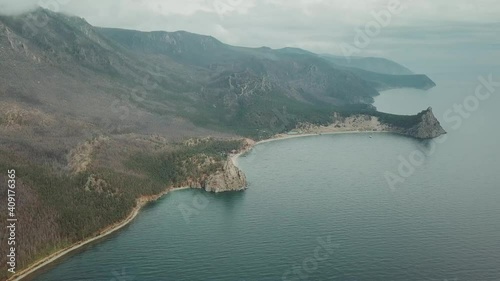 Drone video. Summer. Lake. The mountains. Sandy bay