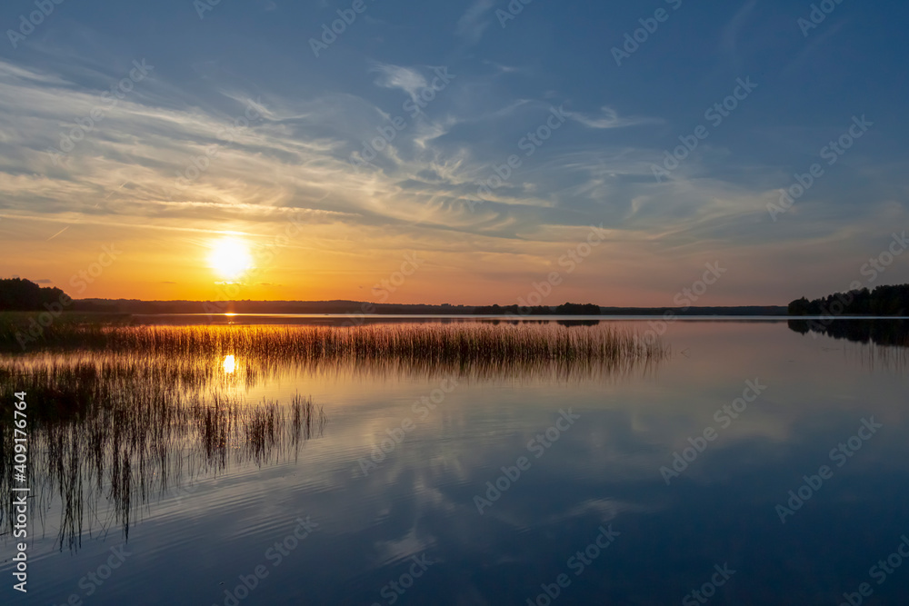 Fototapeta premium magical sunset over a lake in summer in Europe