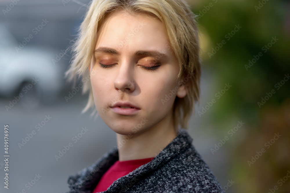 Autumn portrait of young woman in a coat. Selective focus. Autumn portrait of young woman in a coat. Selective focus.