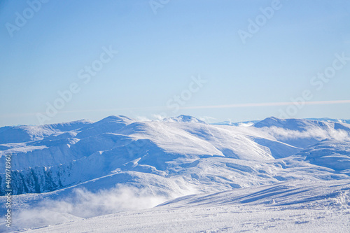 Winter landscape of Carpathians Mountains. Climbing Hoverla. Winter Hoverla mountain.