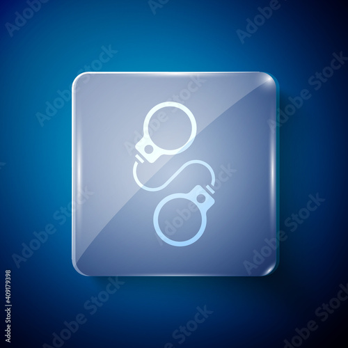 White Handcuffs icon isolated on blue background. Square glass panels. Vector.
