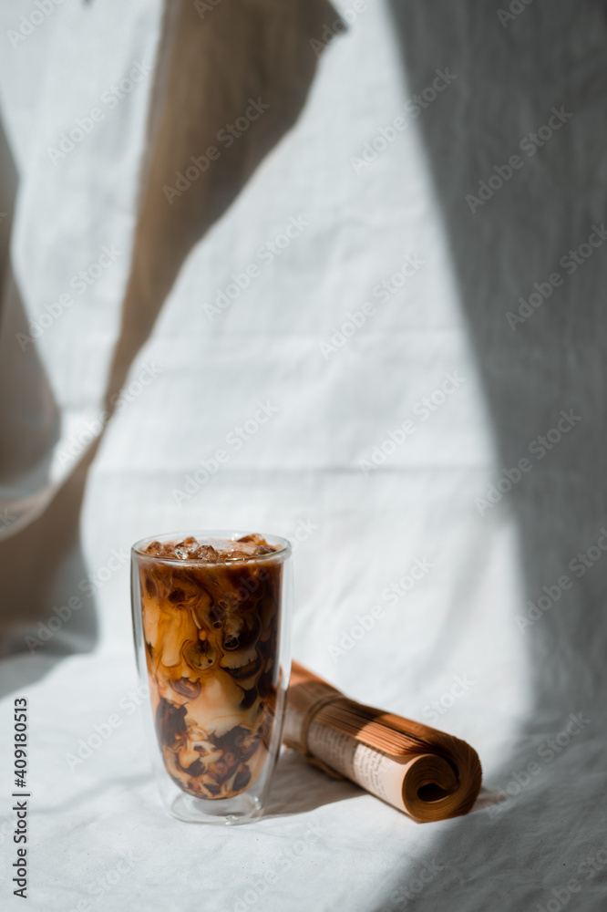 Glass of coffee on white background