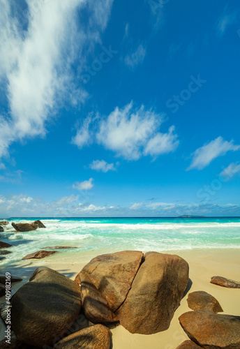 Fototapeta Naklejka Na Ścianę i Meble -  Bright daytime views of Anse Georgette paradise beach on the west coast of Praslin Island in the Seychelles 