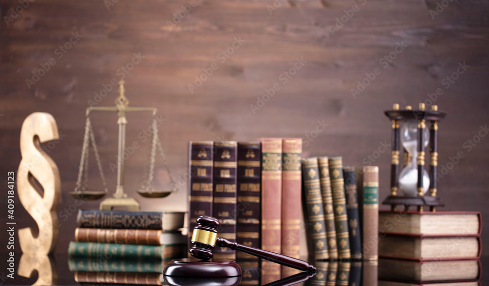 Law theme. Judge chamber. Judge’s gavel, scale and collection of legal