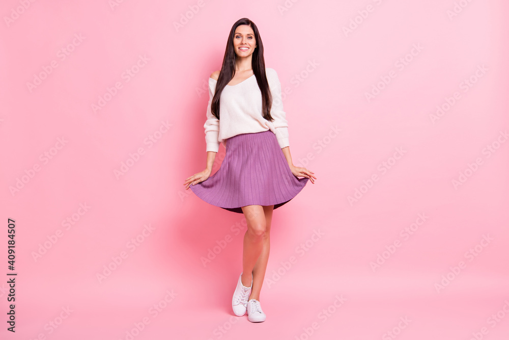 Full size photo of young attractive good mood pretty sweet nice girl posing on camera isolated on pink color background Full size photo of young attractive good mood pretty sweet nice girl posing on camera isolated on pink color background
