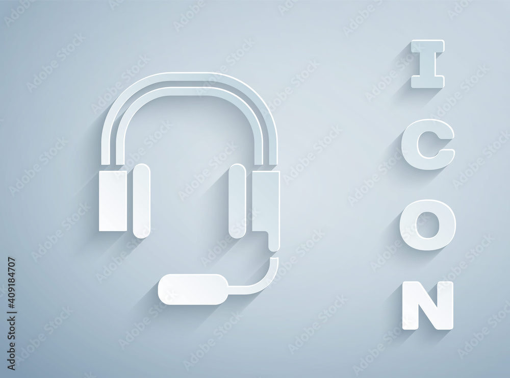 Paper cut Headphones with microphone icon isolated on grey background. Paper art style. Vector. Paper cut Headphones with microphone icon isolated on grey background. Paper art style. Vector.