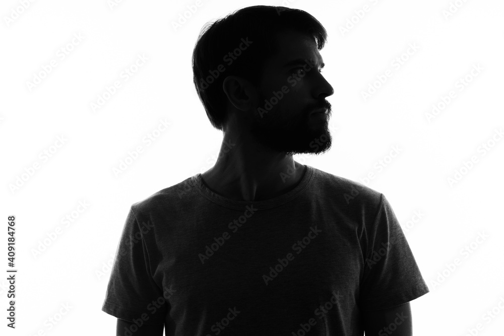 portrait of a man dark silhouette on a light background cropped view Copy Space
