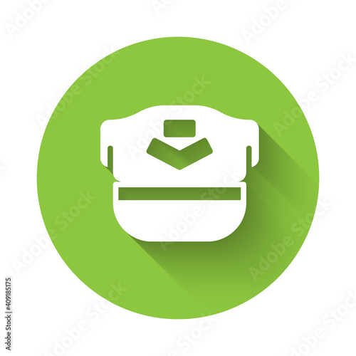 White Pilot hat icon isolated with long shadow. Green circle button. Vector.