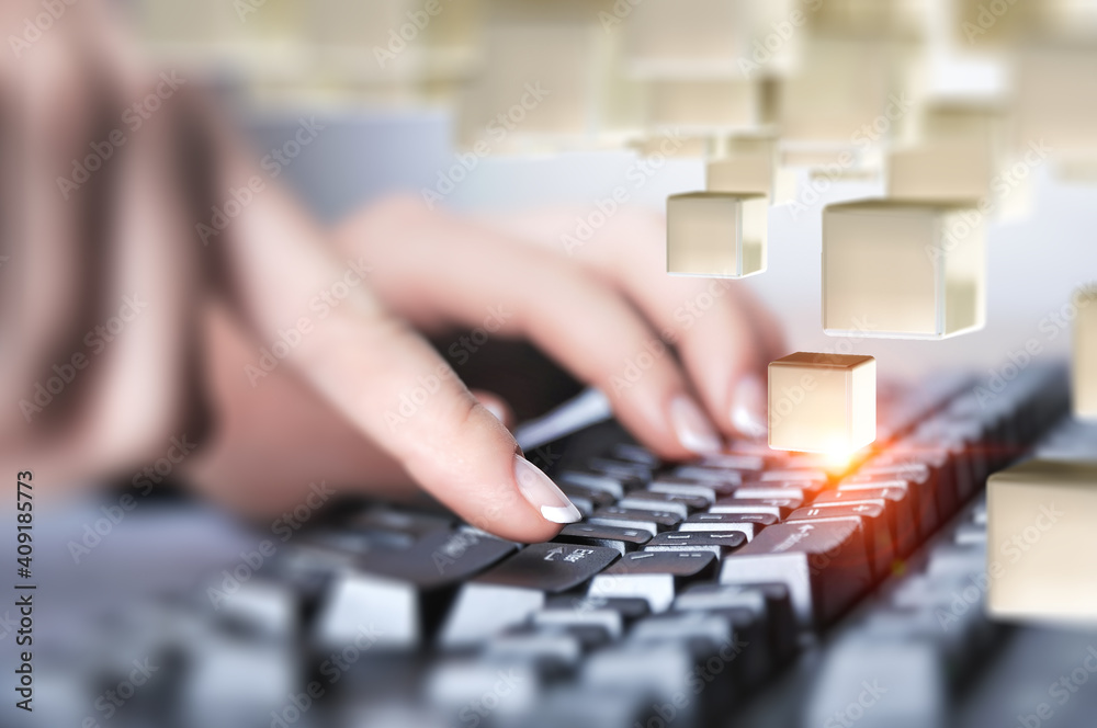 Hands of a young woman on keyboard
