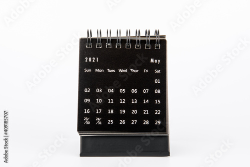 2021 May. Time planning, business, day counting and holidays. Paper calendar on a white table