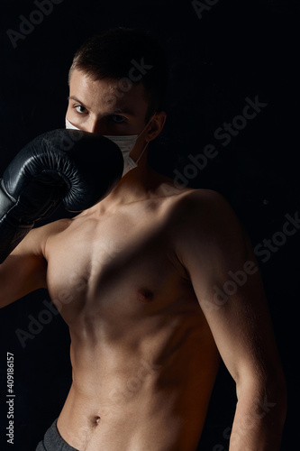 boxer gloved naked torso muscle fitness black background circumcision © SHOTPRIME STUDIO