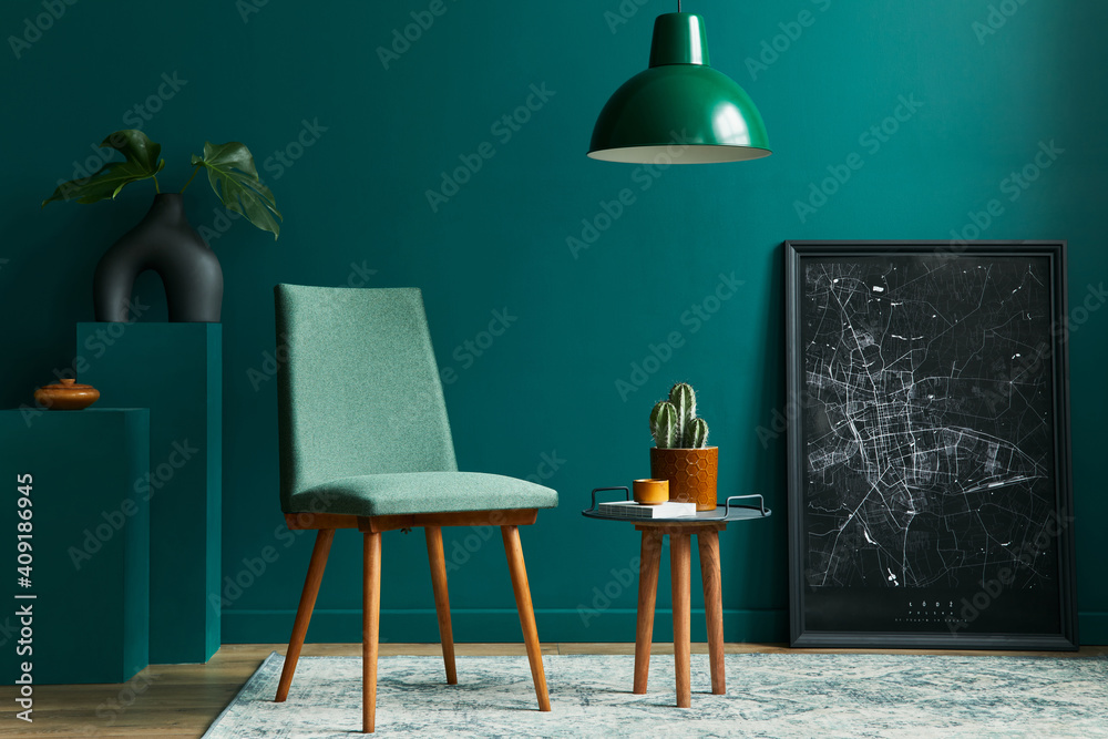 Stylish concept of living room interior with design chair, tropical leaf in vase, black mock up poster map, retro carpet, decoration, cacti, pendatn light and accessories in modern vintage home decor.