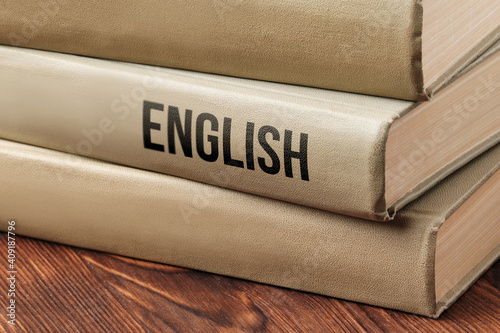 Billede på lærred English subject book concept on a wooden table for learning.
