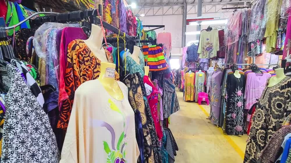 Traditional Malaysian Garments AKA Baju Kurung With Different Colors And Patterns Pan Left To