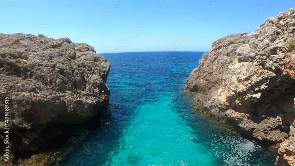 seacoat of mallorca with beaturiful view of the sea with crystalclear water. Sea view of tourquise colour. Concept of summer, travel, relax and enjoy