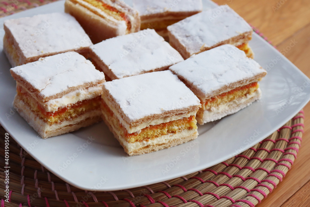 Italian traditional Diplomat or Diplomatic pastries on a plate on wooden table Italian traditional Diplomat or Diplomatic pastries on a plate on wooden table