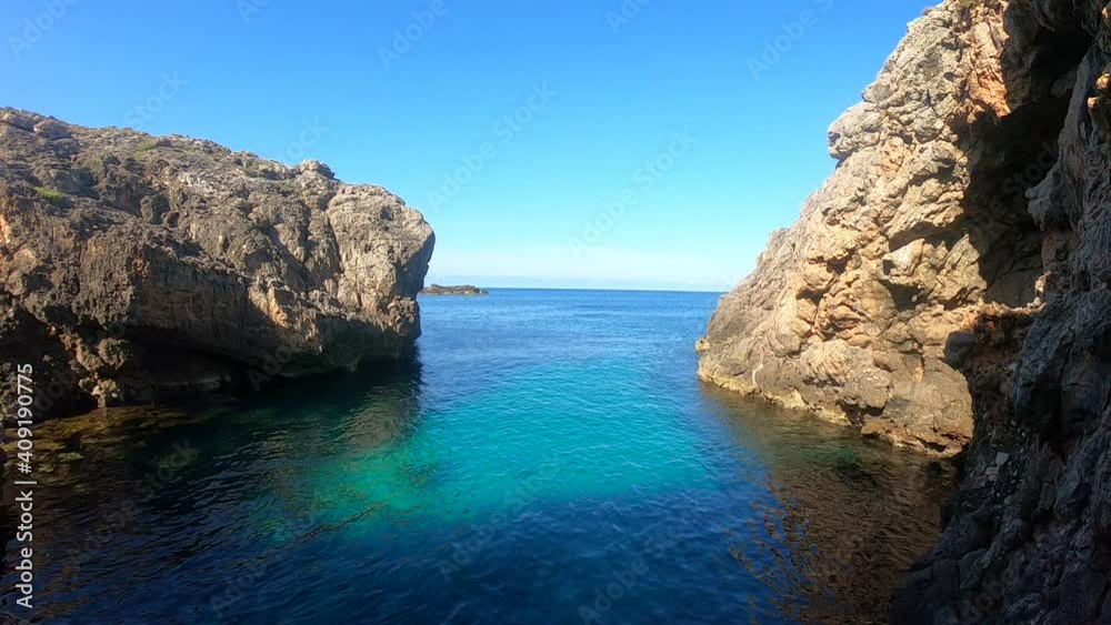 seacoat of mallorca with beaturiful view of the sea with crystalclear water. Sea view of turquoise colour. Concept of summer, travel, relax and enjoy seacoat of mallorca with beaturiful view of the sea with crystalclear water. Sea view of turquoise colour. Concept of summer, travel, relax and enjoy