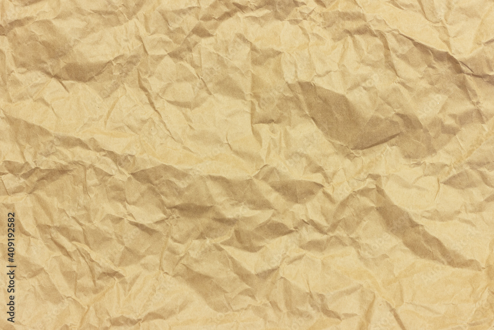 Obraz premium The texture of crumpled brown craft paper.