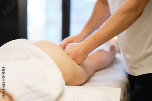 masseur makes anticellulite massage young woman in the spa salon. Body care concept. Special anticellulite treatment.