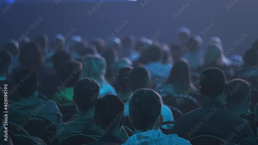 People watching movie in cinema