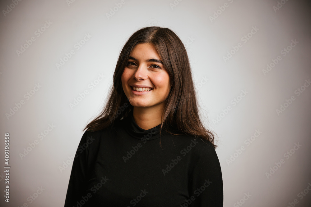 Studio portrait of young beautiful woman on white background - Millennial posing for a service photographic Studio portrait of young beautiful woman on white background - Millennial posing for a service photographic
