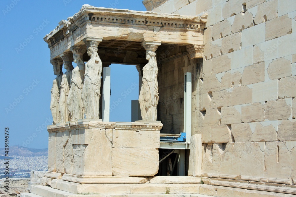 Obraz premium Erechtheion with famous Caryatids, Acropolis hill, Athens historic center, Attica, Greece