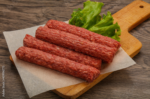 Raw beef sausages with spices