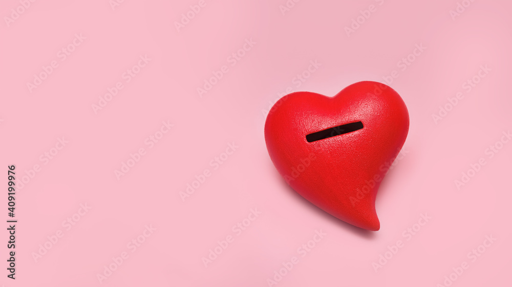 red heart moneybox on pink background, banner, copy space