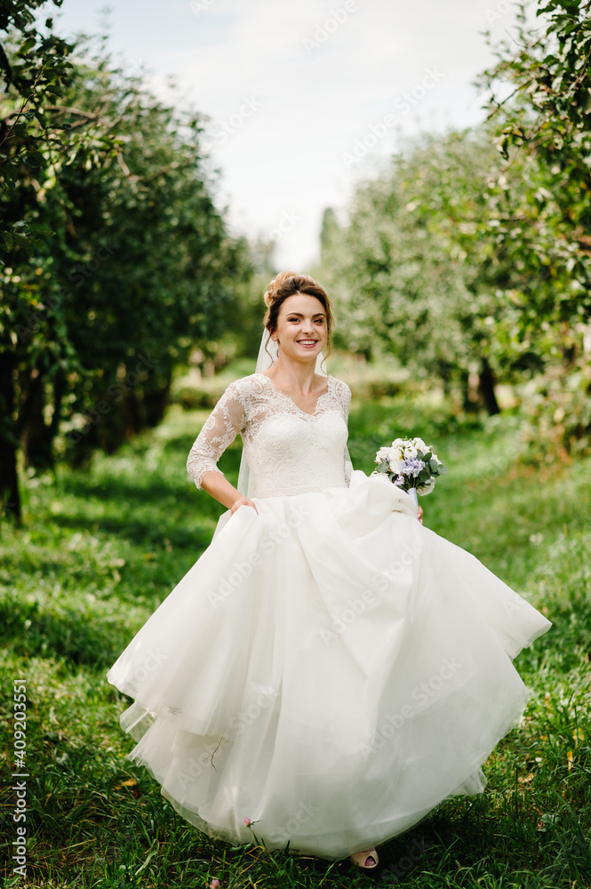 The bride runs in the garden. She escaped from the wedding ceremony. The bride runs in the garden. She escaped from the wedding ceremony.