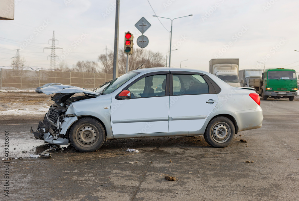 A taxi car at an intersection was involved in a close-up accident