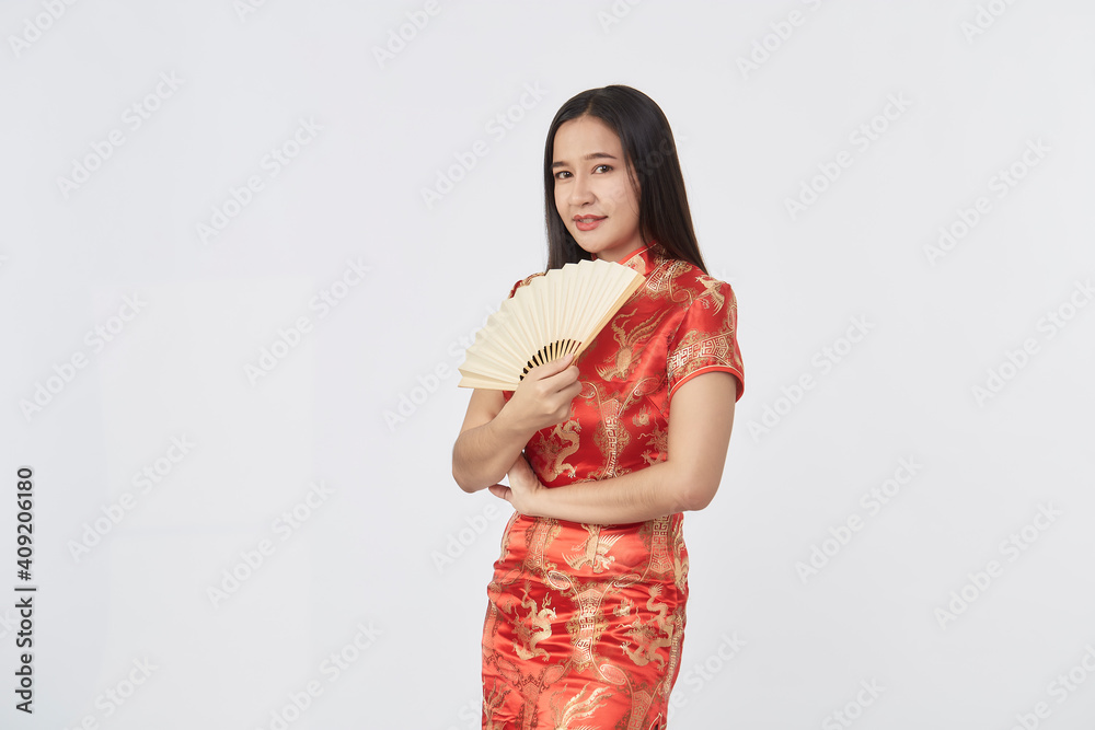 woman red cheongsam dress holding fan