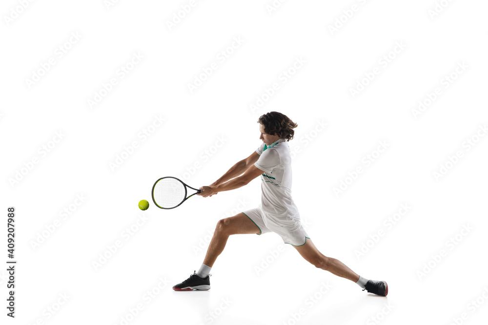 Achievement. Young caucasian professional sportsman playing tennis isolated on white background. Training, practicing in motion, action. Power and energy. Movement, ad, sport, healthy lifestyle