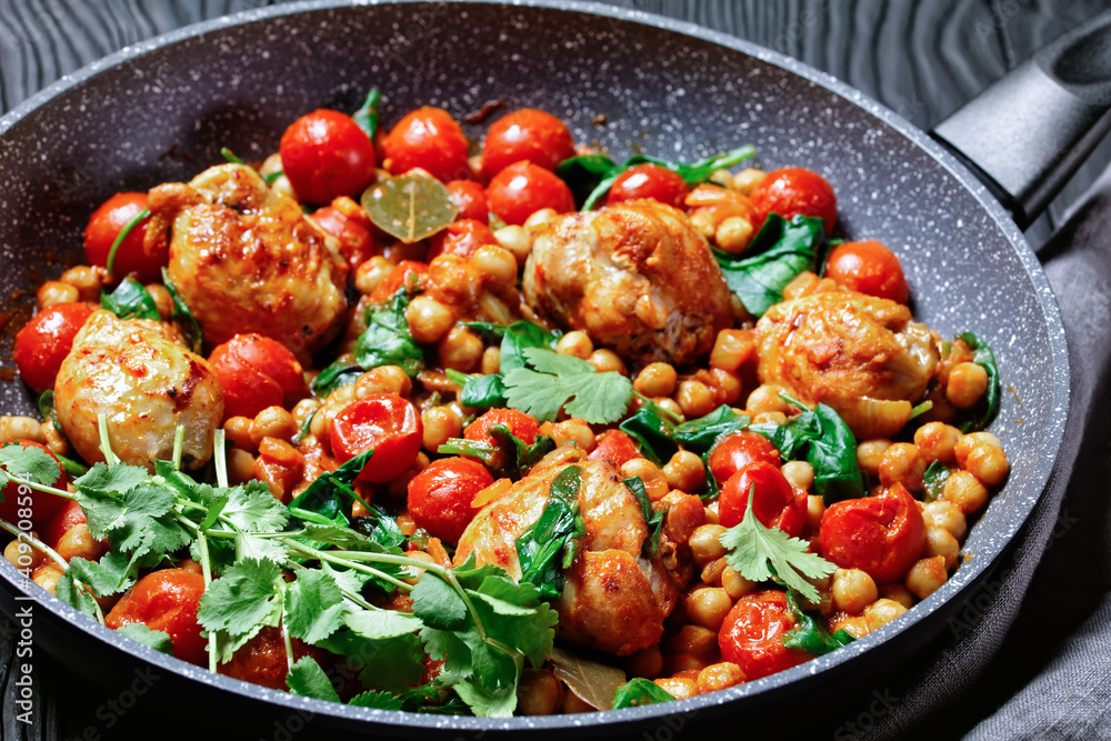 Traditional chicken and chickpea curry, top view Traditional chicken and chickpea curry, top view