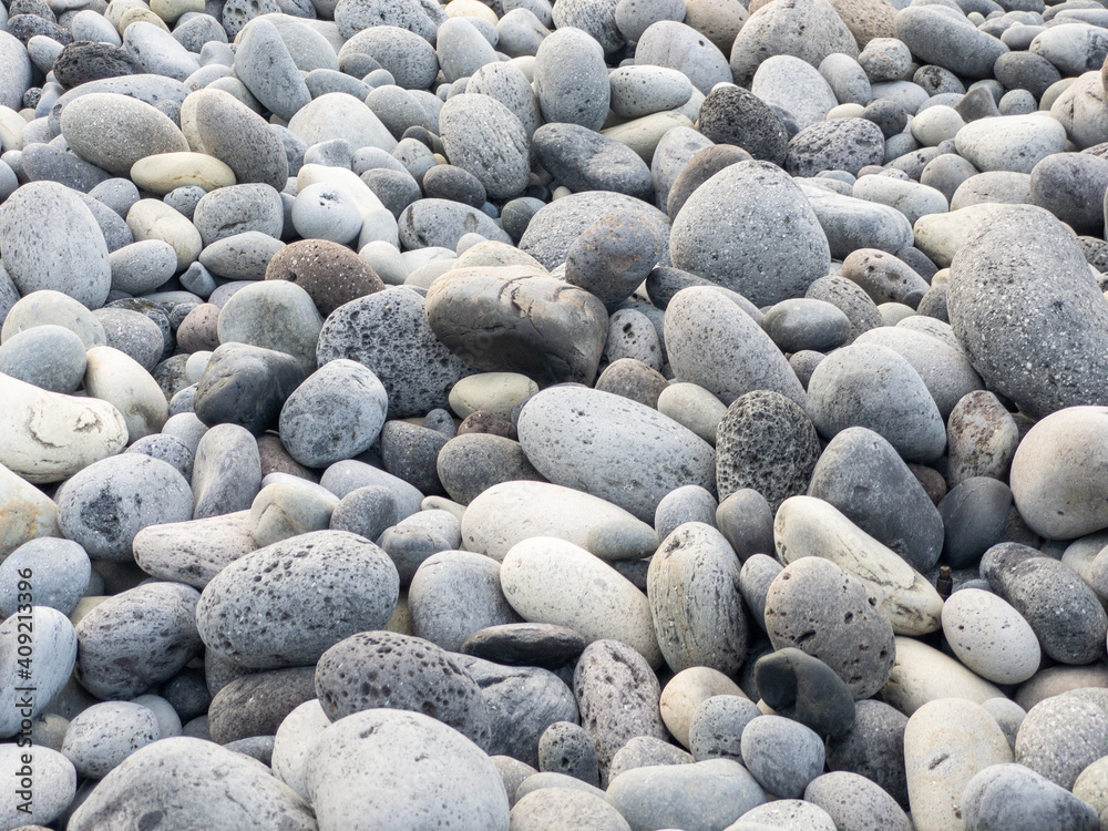 Different colors of pebbles on Reunion island east sea shore Different colors of pebbles on Reunion island east sea shore