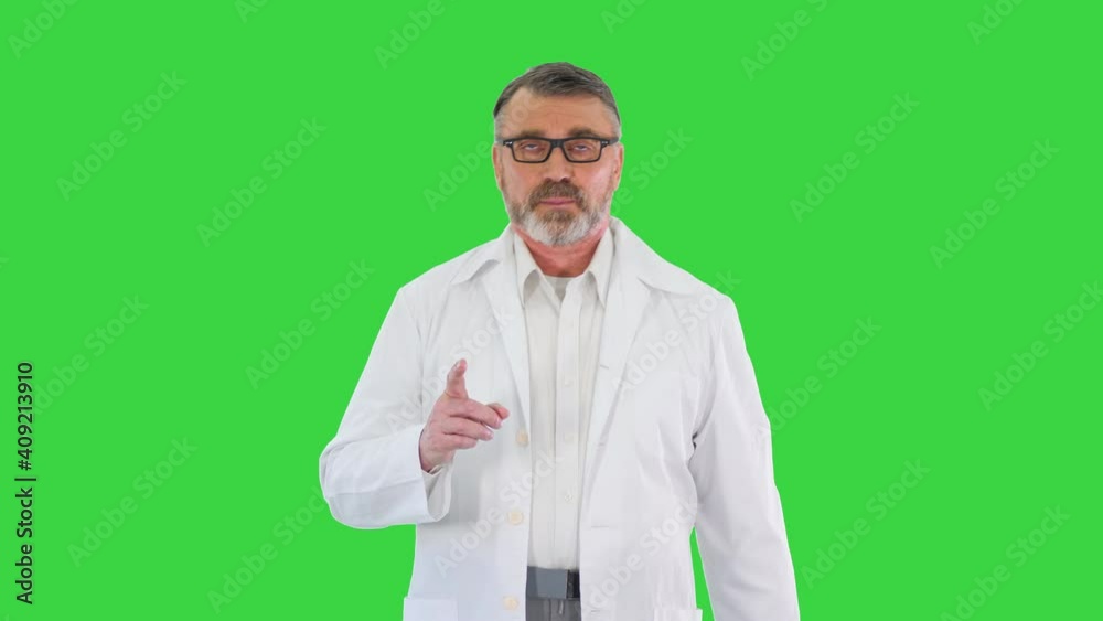 Doctor consulting patient while walking on a Green Screen, Chroma Key. Doctor consulting patient while walking on a Green Screen, Chroma Key.