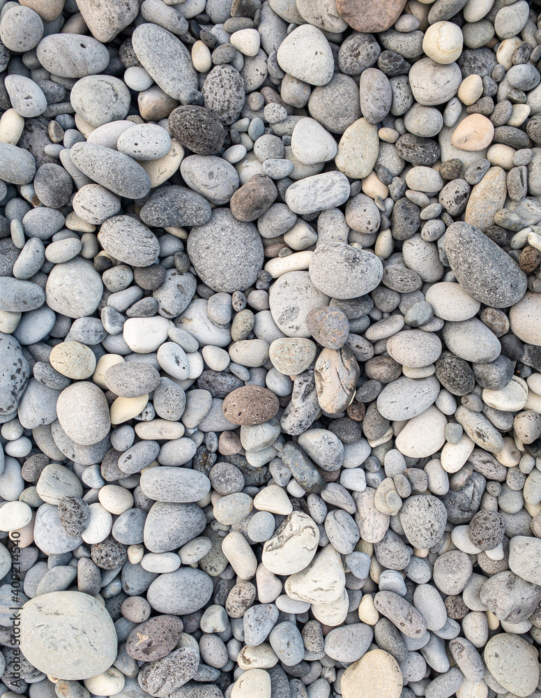 Different colors of pebbles on Reunion island east sea shore Different colors of pebbles on Reunion island east sea shore