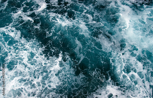 Aerial view to ocean waves.