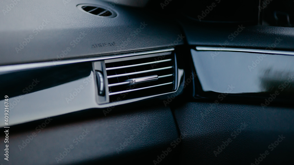 Air conditioner system in modern car, close up. 