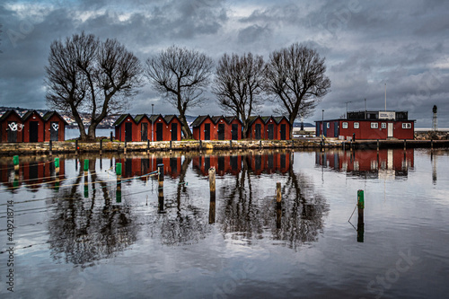 Fishermens houses in marina i lake Vättern, Jönköping, Sweden photo