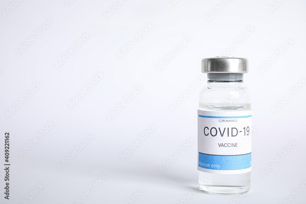 Vial with coronavirus vaccine on white background, space for text Vial with coronavirus vaccine on white background, space for text