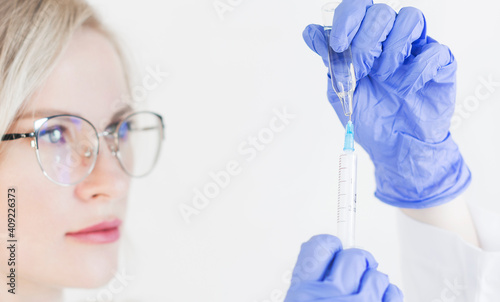 injecting injection vaccine vaccination medicine doctor insulin health drug influenza concept - stock image