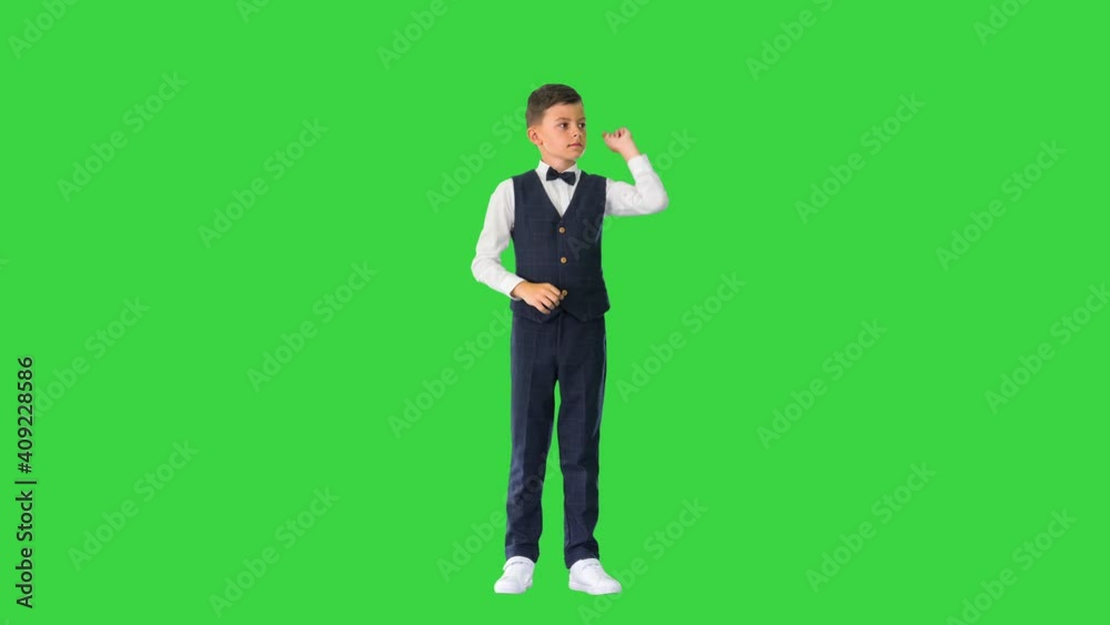 School boy using virtual screen on a Green Screen, Chroma Key. School boy using virtual screen on a Green Screen, Chroma Key.
