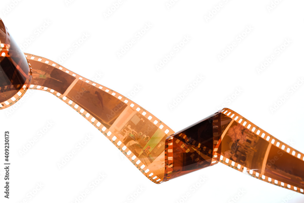 The film strip for old film cameras is stretched, the background