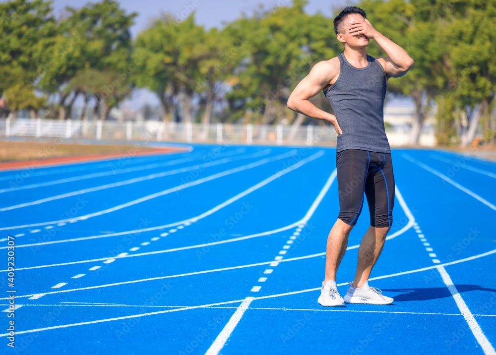 Obraz premium Young fitness man holding his sports injury, muscle painful during training